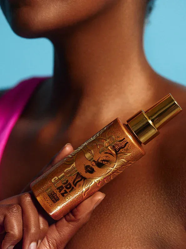 body glaze body shimmer by peaches and cream shown being worn and in models hand