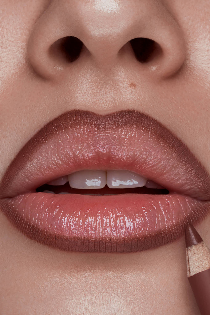 Punchline lip liner shown on model's lips