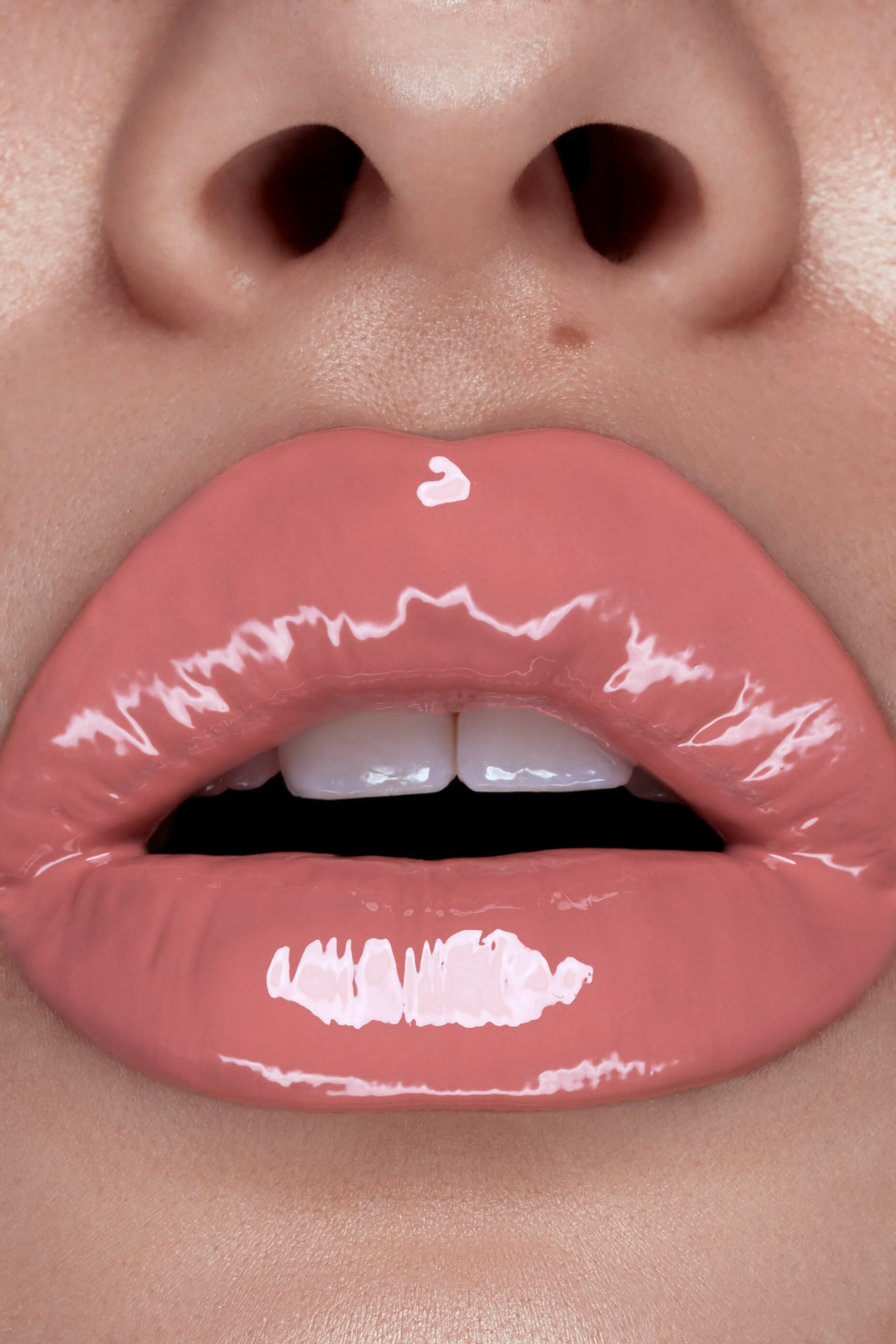 Babe lip gloss shown on model's lips