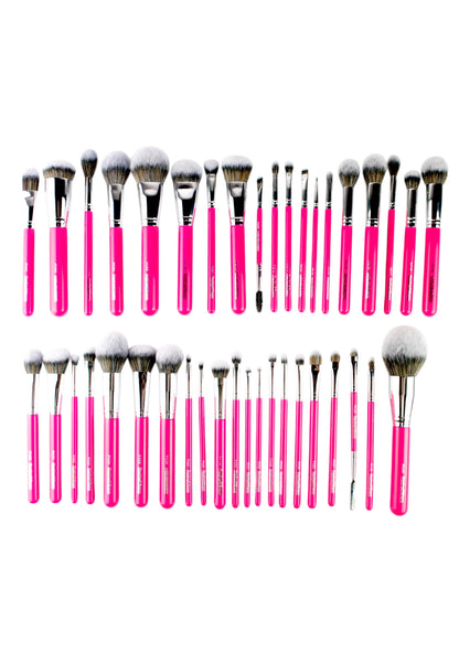 Set of makeup brushes with pink handles for face and eye 