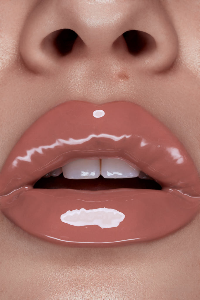 Bambi lip gloss shown on model's lips