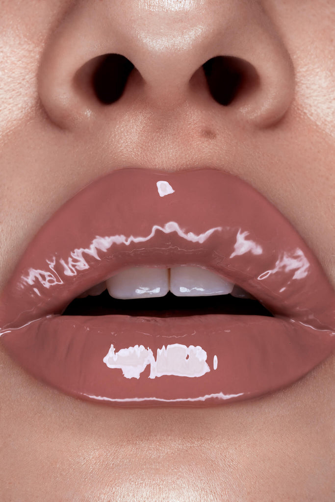 Fudge lip gloss shown on model's lips
