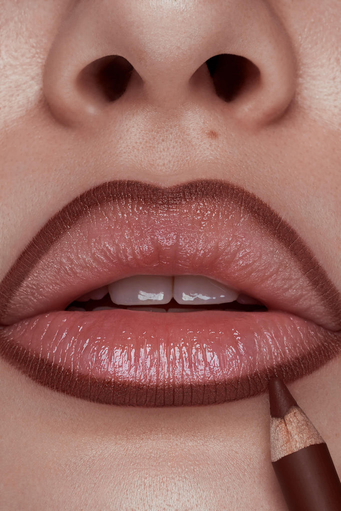 Hotline lip liner shown on model's lips