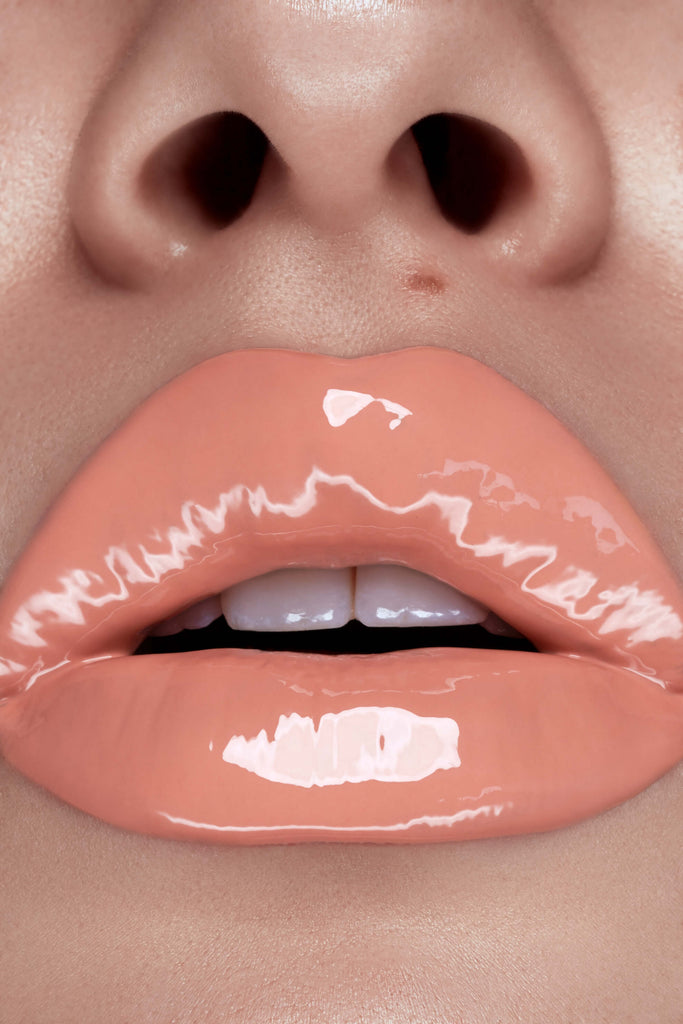 Dream On lip gloss shown on model's lips