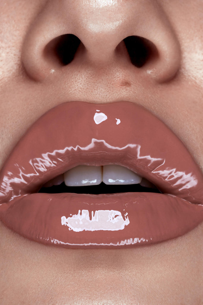 Melrose lip gloss shown on model's lips